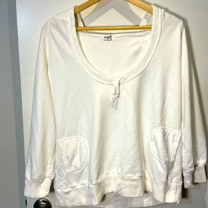 OM Girl cropped white sweatshirt SZ L. 2 front pockets and tie at the neckline.